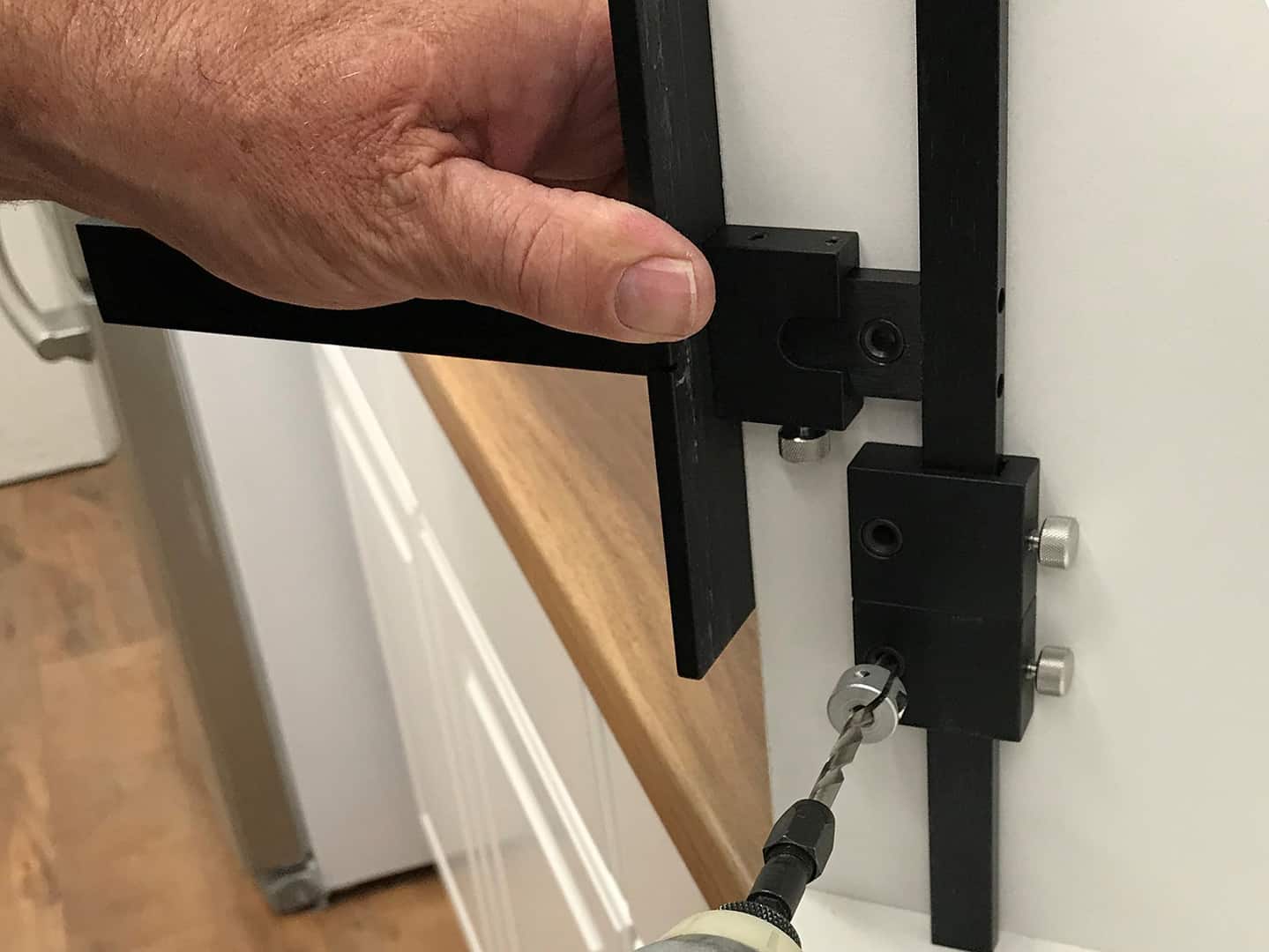 how to drill hinge plate holes with TP-1934 Cabinet Hardware Jig (step 6)