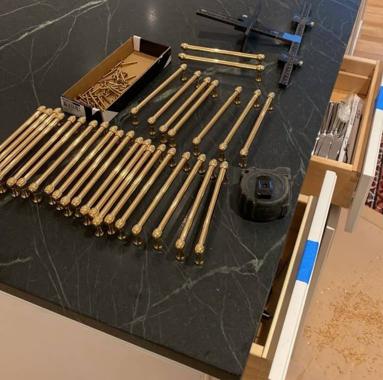 Finish installation with cabinet hardware