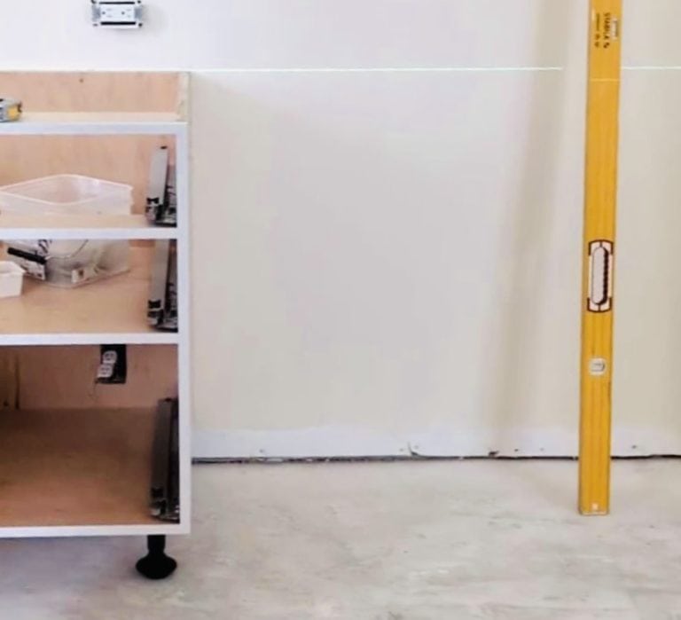 Level cabinets from the highest point.